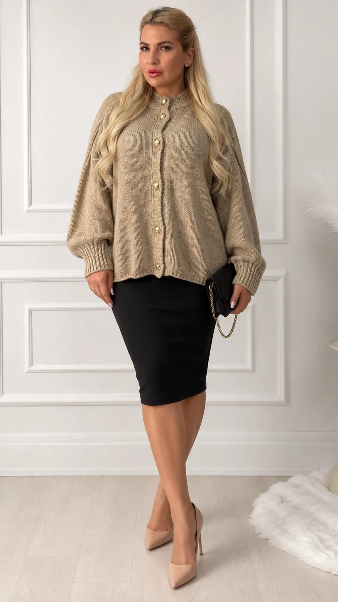 Elegants džemperis ar pogām un apjomīgām piedurknēm